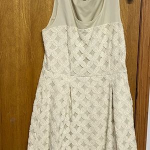 Tan sleeveless to the kneecap. Sheer on the top.